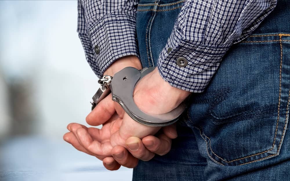 Photo of a Criminal in Handcuffs